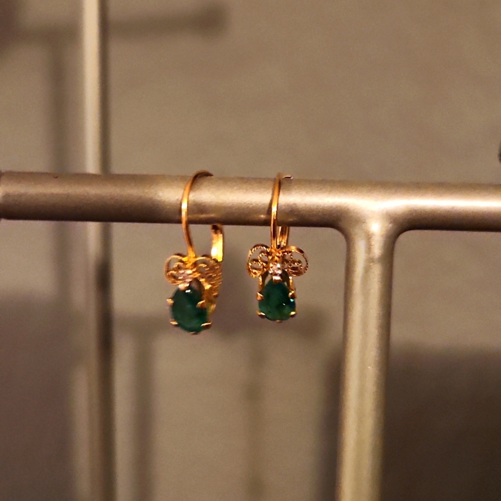 14k gold and real emerald earings.